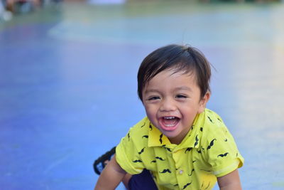 Portrait of smiling girl in swimming pool