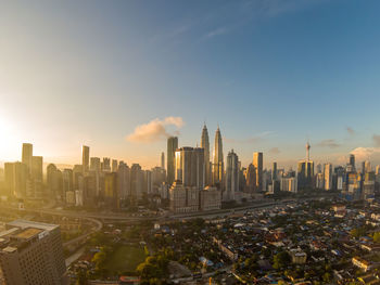 View of buildings in city against sky