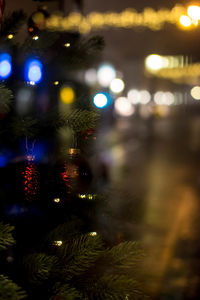 Close-up of illuminated christmas tree at night