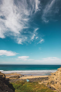 Scenic view of beach against sky