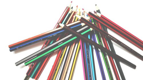 Low angle view of colorful flags against sky