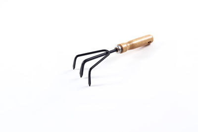 High angle view of machine part against white background
