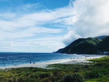 Scenic view of beach against sky