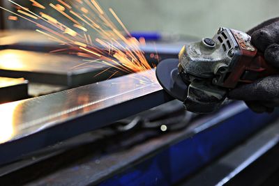 Close-up of worker working in factory