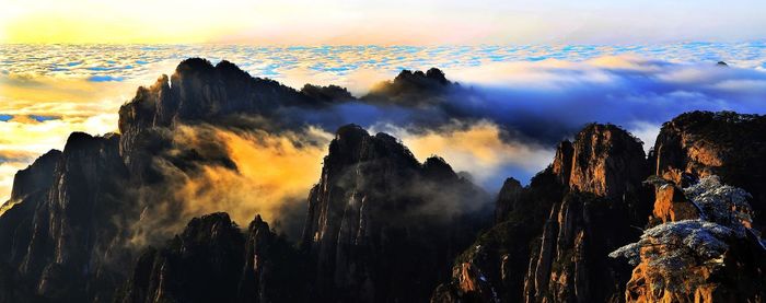 Scenic view of mountains at sunset