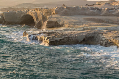 Scenic view of rocks in sea