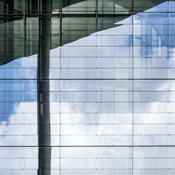 Reflection of building on glass