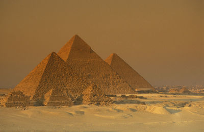 Ancient pyramids against clear sky