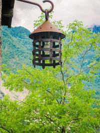 Close-up of abandoned house against sky