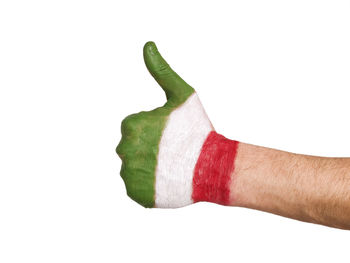 Close-up of man hand against white background