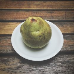 High angle view of apple on table