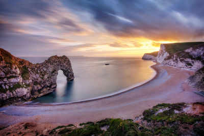 Scenic view of sea against sky during sunset