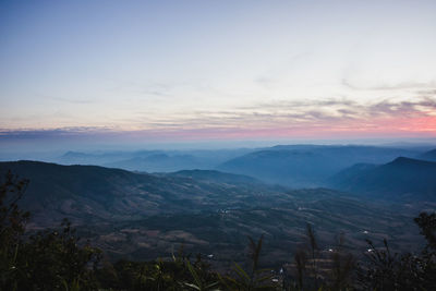 High angle view of mountains against sky during sunset