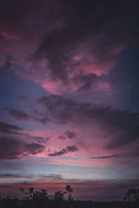 Low angle view of dramatic sky during sunset