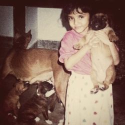 Cute girl with dog at home