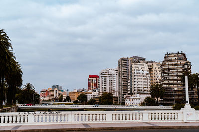 Buildings in city against sky