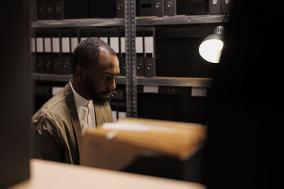 Portrait of businessman working at office