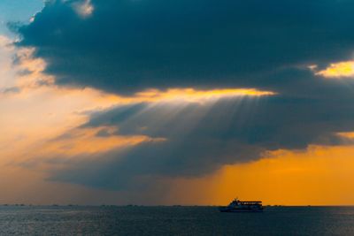 Scenic view of dramatic sky over sea