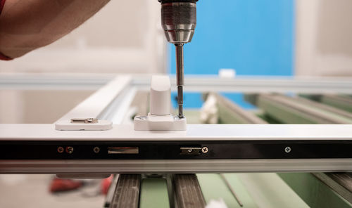 Close-up of hand using mobile phone