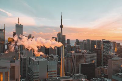 Panoramic view of buildings against sky during sunset