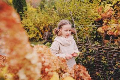 Girl in park during autumn