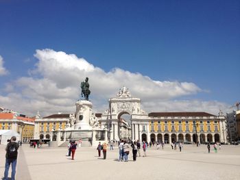 Statue in front of historical building