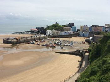 High angle view of beach against sky in city