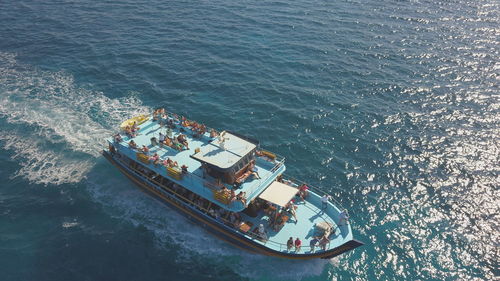 High angle view of ship sailing on sea