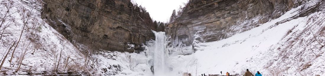 Panoramic view of mountains against sky during winter