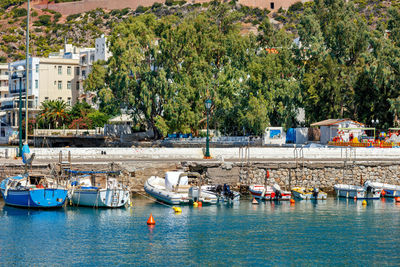 The picturesque promenade of loutraki bay, greece, where old fishing schooners,boats and boats moor