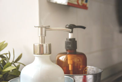 Close-up of faucet in bathroom at home