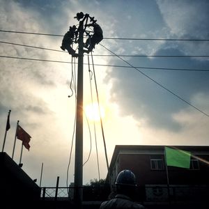 Low angle view of power lines