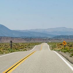 Sumertime on a rollercoaster road in the desert. 