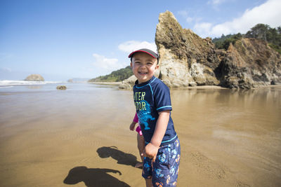 Portrait of smiling happy boy at the beach.