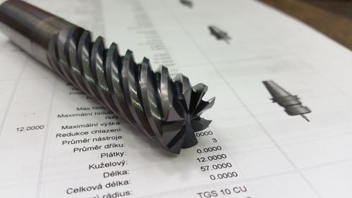 Close-up of end mill on paper