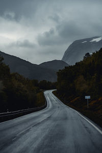 Empty road against sky