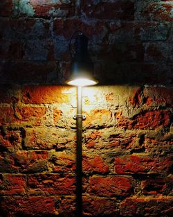 Low angle view of illuminated light bulb