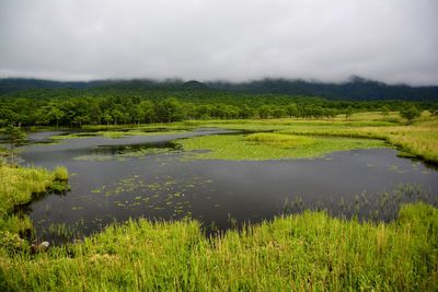 Scenic view of lake go-ko against sky, at shiretoko national park.