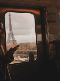 Man seen through train window