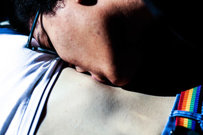 Close-up portrait of young man with eyes closed