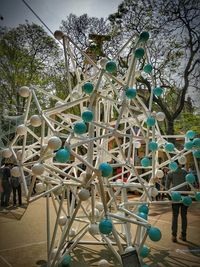 High angle view of people on table against trees