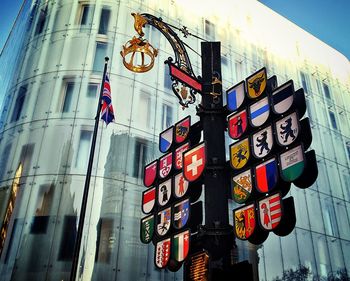 Low angle view of information sign in city