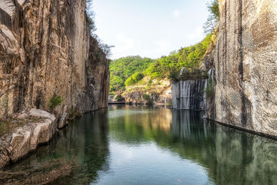 Small lake in pocheon art valley. an old granite quarry turned into park with famous granite cliffs.