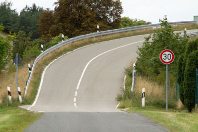 Road amidst trees