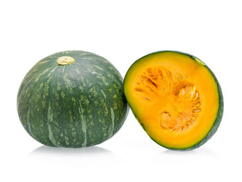 Close-up of oranges against white background