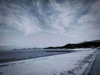 Scenic view of beach against sky