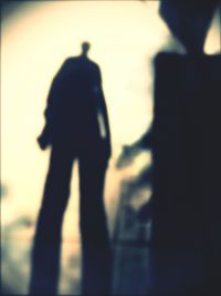 Silhouette woman in dark background