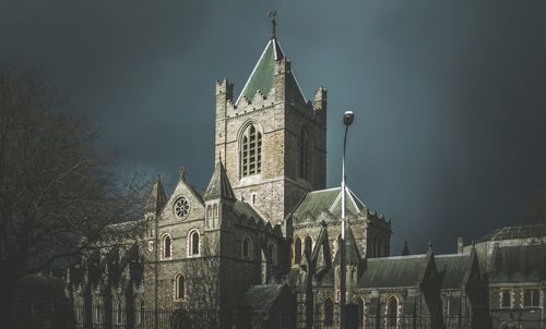 Low angle view of clock tower against sky