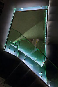 Low angle view of broken glass building