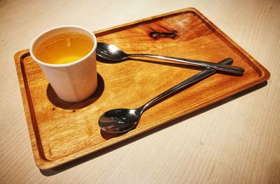 High angle view of coffee cup on table